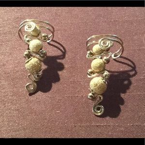 NWOT Unique Crawl earrings silver and gold tone.